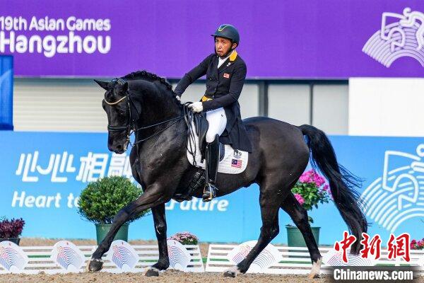 （杭州亚运会）马来西亚老将获马术金牌  参加六届亚运会终夺冠